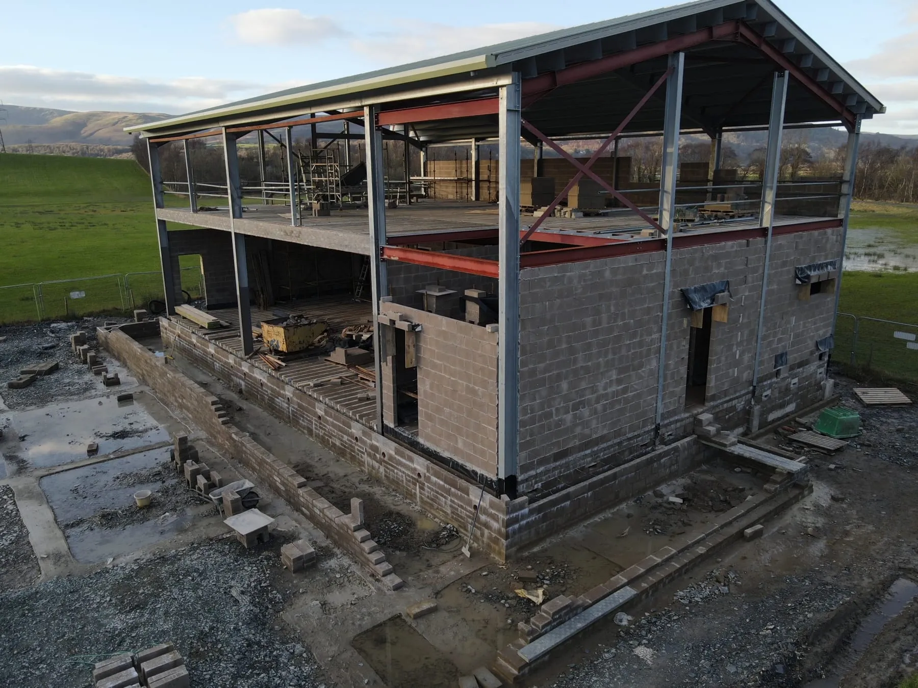 The steel frame and block walls of the new base under construction